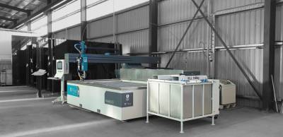 Waterjet in Glass Facility with Hyperjet Pump & Abrasive Sludge Removal System 